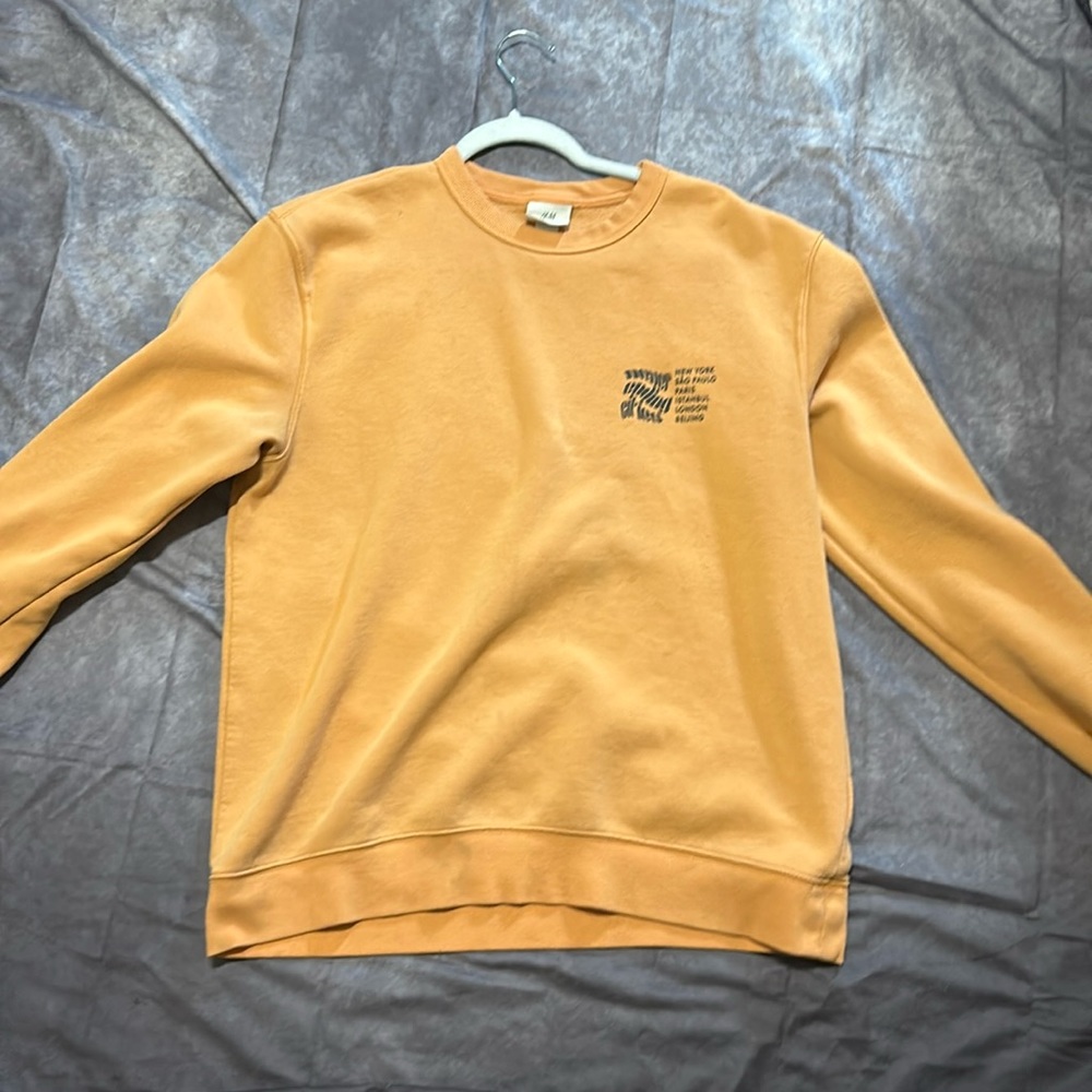 Orange sweat shirt